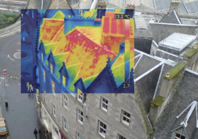 Thermal image of a house showing where heat escapes